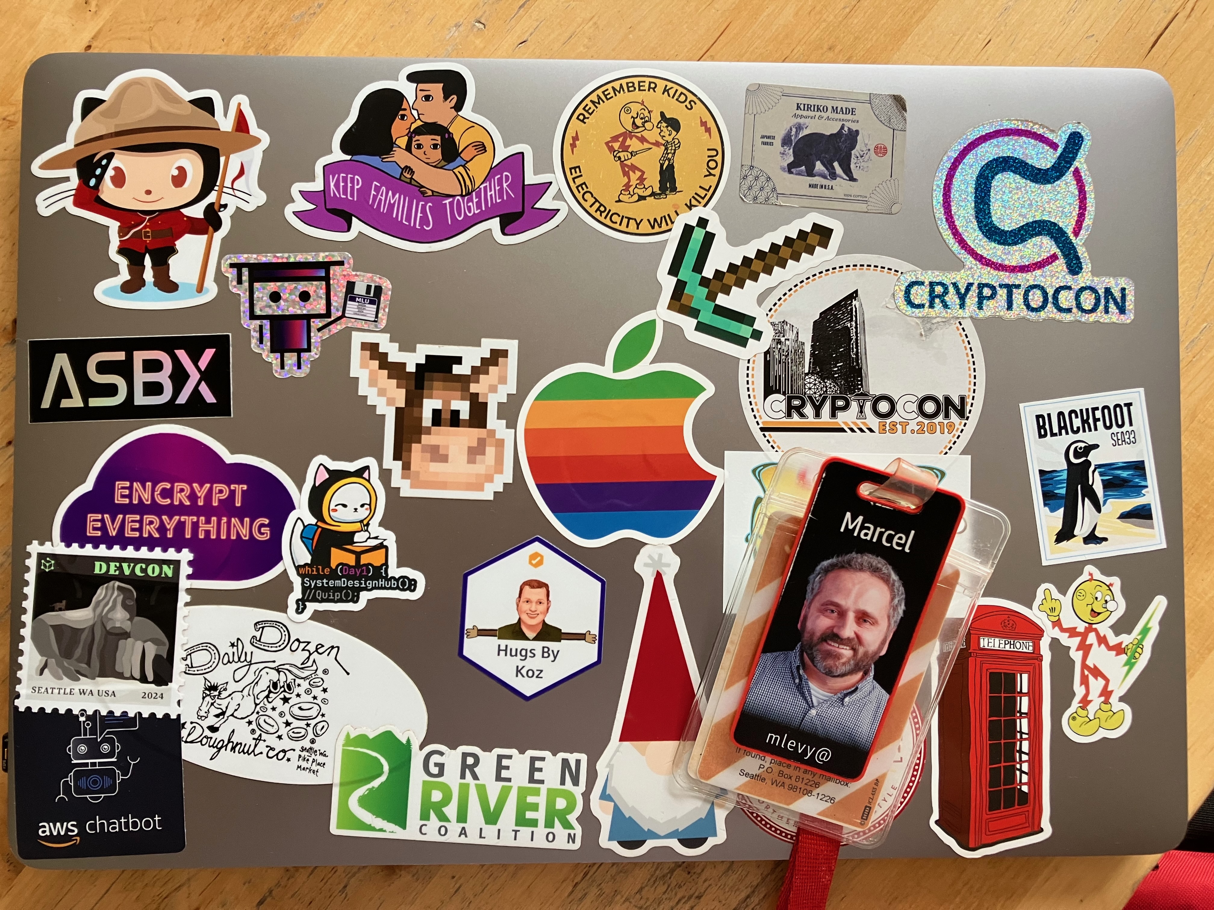 Amazon laptop and badge